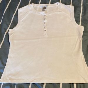 Womens snap-front sleeveless top. 100% cotton.